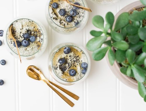 brass-colored spoon near glass of ice cream