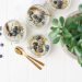 brass-colored spoon near glass of ice cream